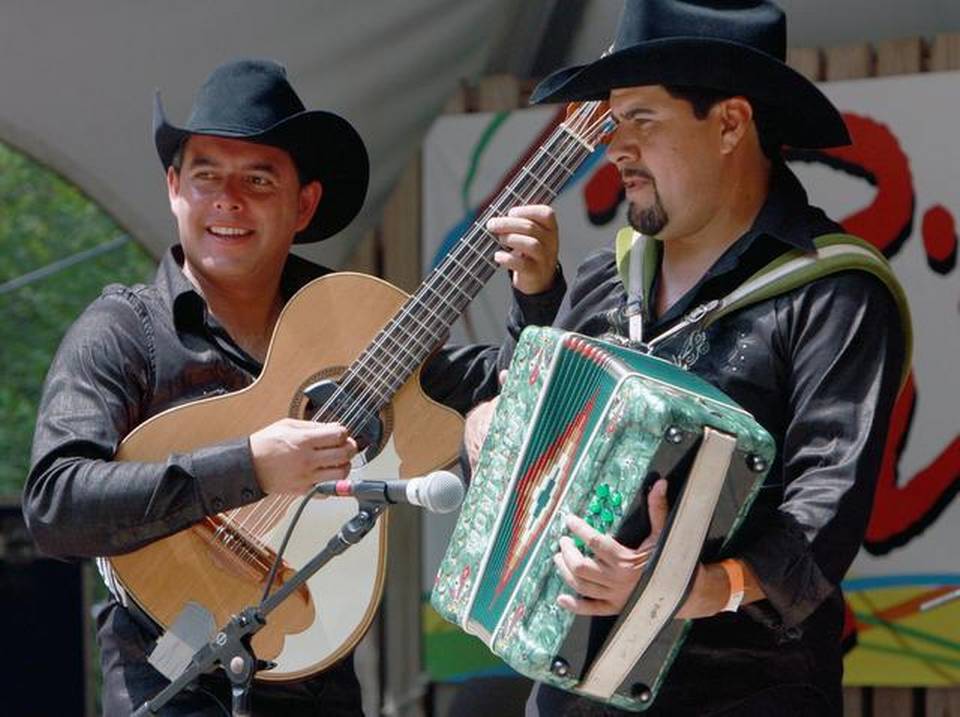 A band performs during the Ritmo Latino Festival in Cary’s Fred G. Bond Metro Park in 2010. Source of image http://www.newsobserver.com/latest-news/81b690/picture7143794/ALTERNATES/FREE_960/beaU8.So.156.jpeg